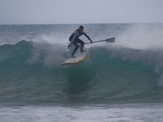 Catching waves with a paddle